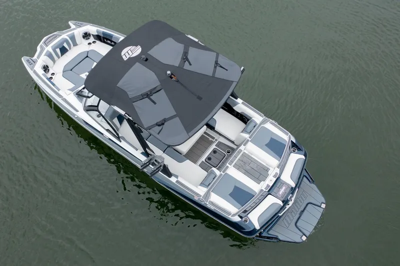 Slide: The Image of 2021 Malibu Wakesetter 23 MXZ boat on water, aerial view. - 6