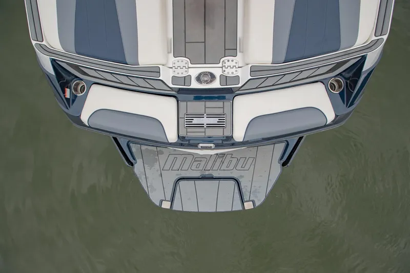 Slide: The Image of Overhead view of 2021 Malibu Wakesetter 23 MXZ boat on water. - 9