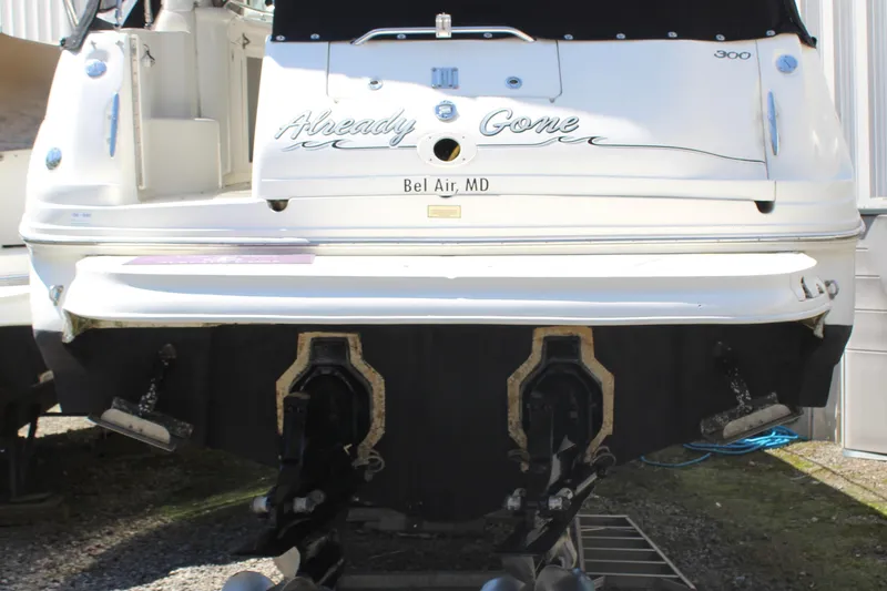 Slide: The Image of 2005 Sea Ray 300 Sundancer boat stern view with dual propellers, docked in Bel Air, MD. - 7