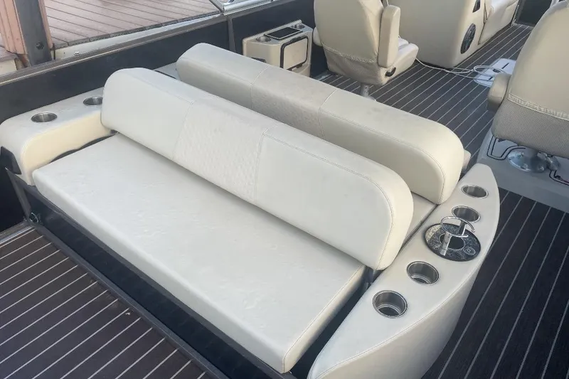 Slide: The Image of Steering wheel and dashboard of 2022 Premier Solaris 230 boat with Simrad display. - 19