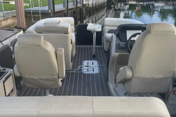 Slide: The Image of Premier Solaris 230 boat dashboard with steering wheel and controls, 2022 model. - 20