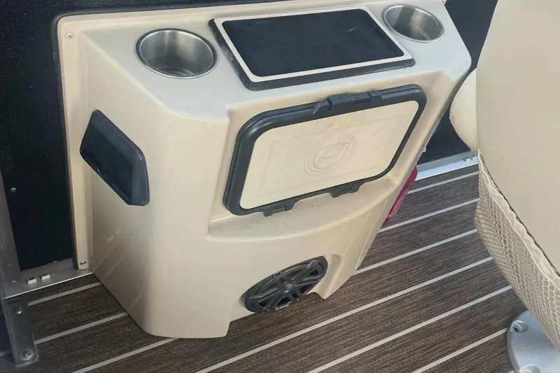 Slide: The Image of Interior of 2022 Premier Solaris 230 boat with luxurious seating and modern dashboard. - 22