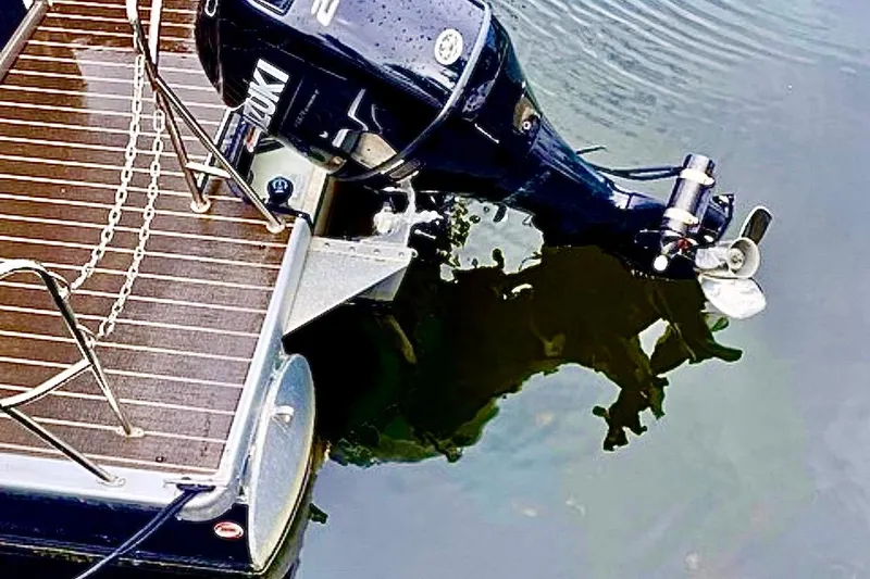 Slide: The Image of Cockpit of 2022 Premier Solaris 230 boat with steering wheel and control panel. - 28