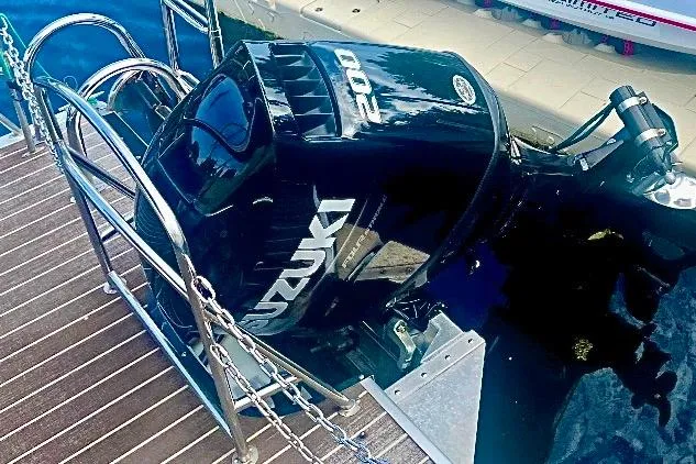 Slide: The Image of Interior of 2022 Premier Solaris 230 boat with steering wheel and control panel. - 29