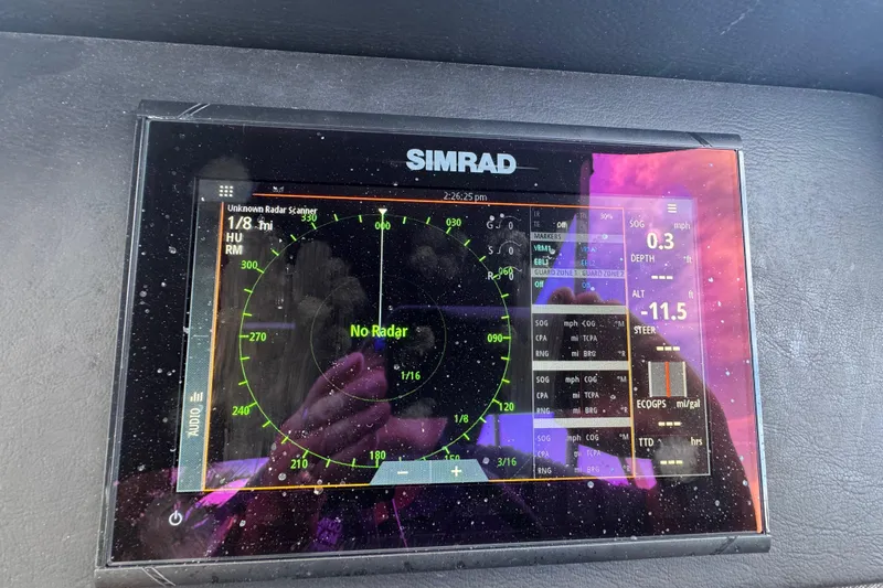 Slide: The Image of Luxurious seating on 2022 Premier Solaris 230 boat, docked by waterfront homes. - 38