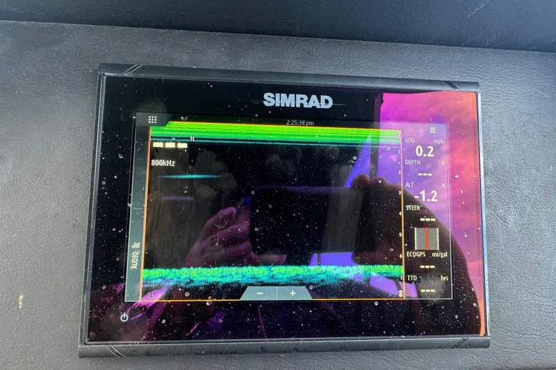 Slide: The Image of Premier Solaris 230 boat interior, 2022 model, featuring luxurious seating and modern controls. - 40