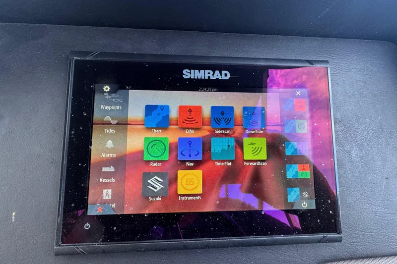 Slide: The Image of Simrad radar display on 2022 Premier Solaris 230 boat dashboard, showing navigation data. - 42