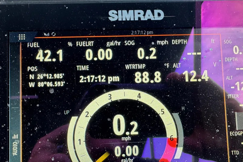 Slide: The Image of Simrad display on Premier Solaris 230, 2022 model, showing sonar and navigation data. - 44
