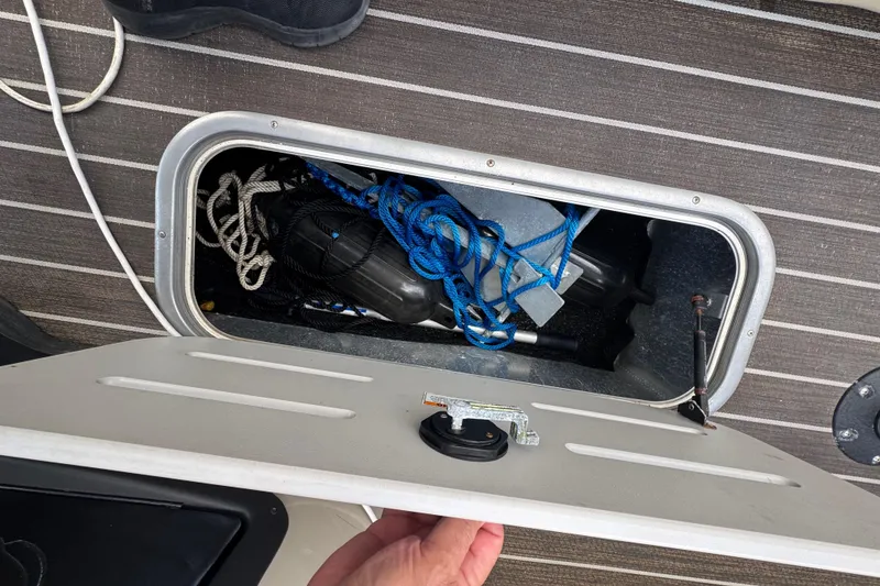 Slide: The Image of Battery switch on Premier Solaris 230 boat, 2022 model, with textured flooring. - 50