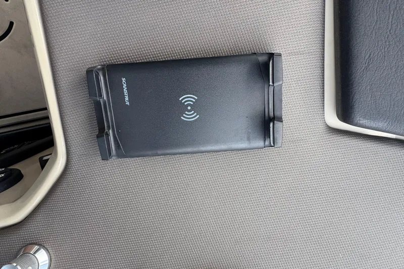 Slide: The Image of Interior view of 2022 Premier Solaris 230 boat with storage compartment open. - 53