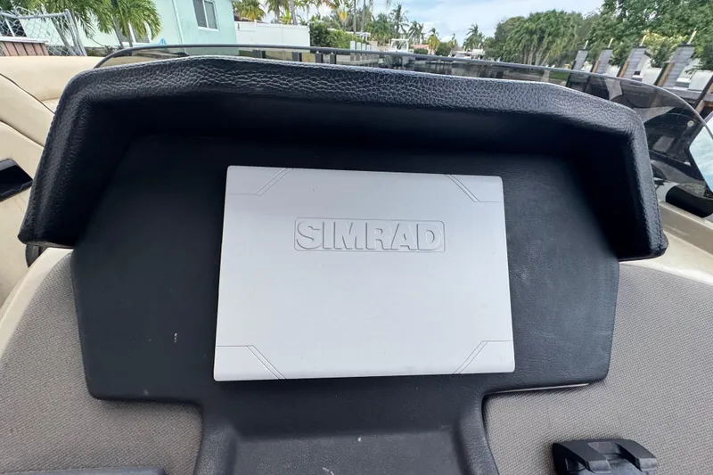 Slide: The Image of Control panel and speaker on 2022 Premier Solaris 230 boat interior. - 56