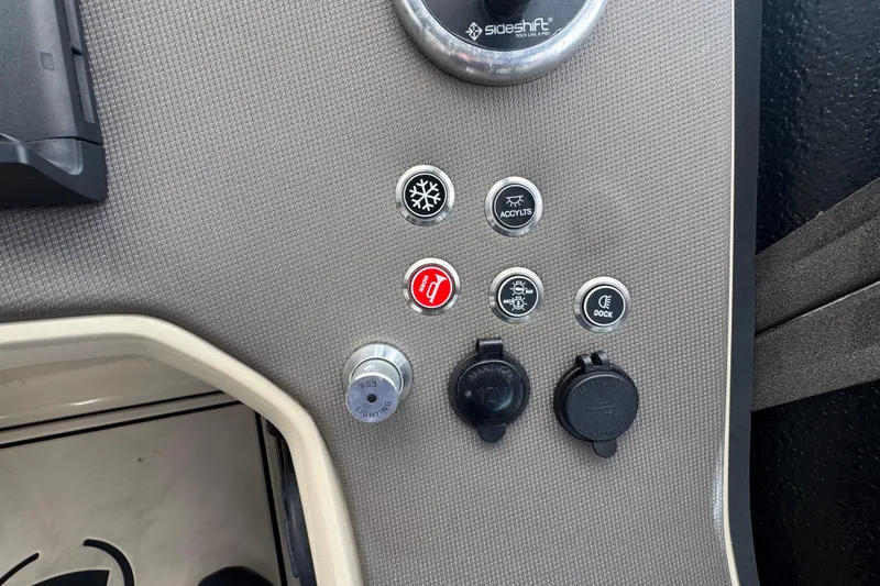 Slide: The Image of Wireless charging pad in a 2022 Premier Solaris 230 boat interior. - 57