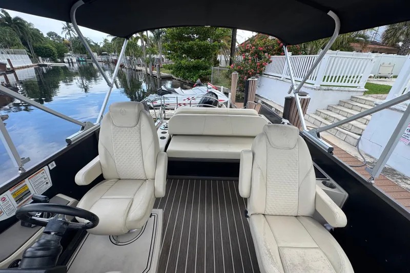 Slide: The Image of Dashboard of 2022 Premier Solaris 230 with Simrad navigation system. - 60