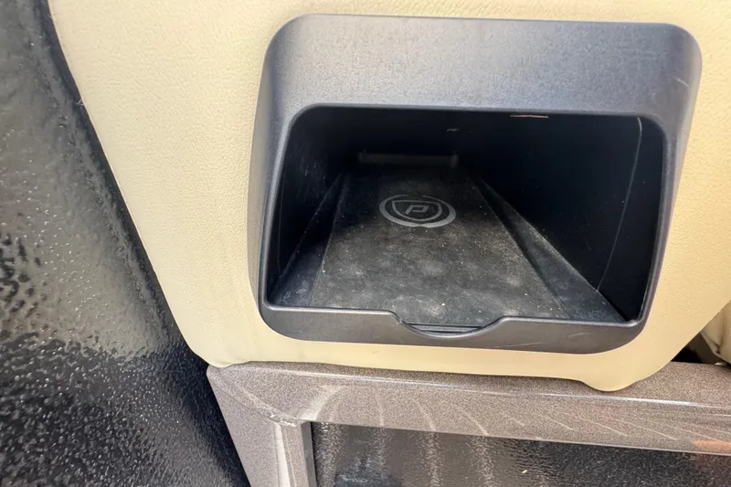 Slide: The Image of Captain's chair on 2022 Premier Solaris 230 boat, featuring luxurious beige upholstery. - 63