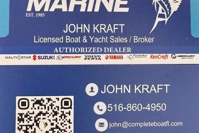Slide: The Image of Business card for John Kraft, licensed boat and yacht sales broker, with contact details. - 83
