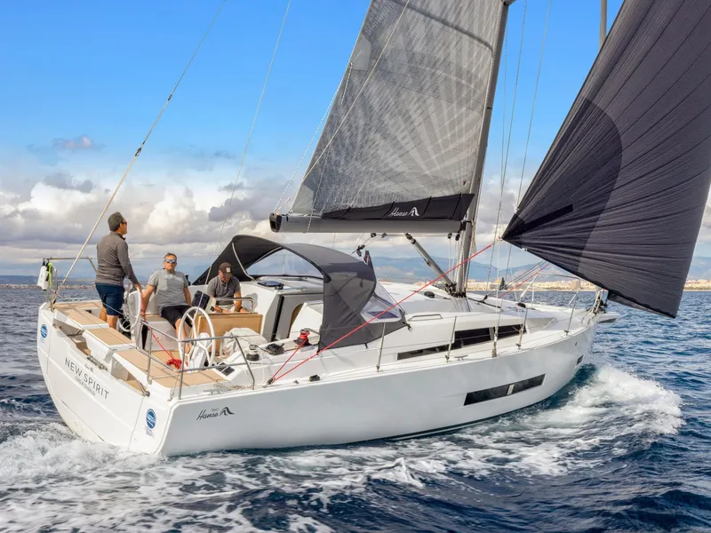 Slide: The Image of 2025 Hanse 360 #41 sailing yacht on open water with crew onboard. - 10