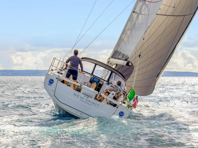 Slide: The Image of Sailing yacht Hanse 360 #41, 2025 model, navigating open waters under clear skies. - 6