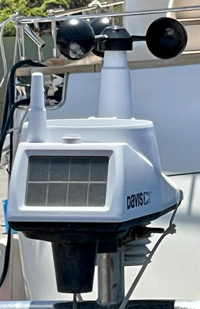 Slide: The Image of Weather station on Aleutian 51 yacht, 1977 model, featuring solar panel and anemometer. - 31