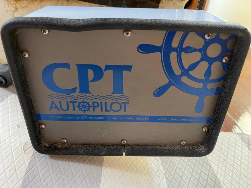 Slide: The Image of CPT Autopilot device with nautical wheel design, manufactured by CPT Autopilot Inc., USA. - 35