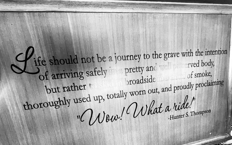 Slide: The Image of Plaque with Hunter S. Thompson quote on Aleutian 51, 1977 model. - 42