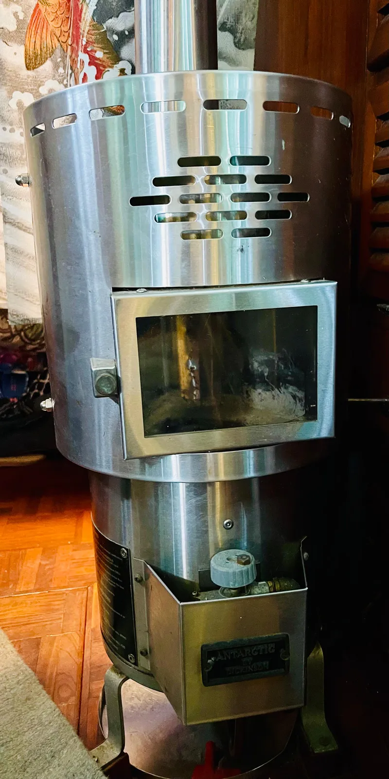 Slide: The Image of Vintage Aleutian 51 stove from 1977 with a stainless steel finish. - 46