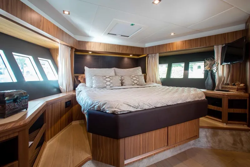 Slide: The Image of Luxurious bedroom interior of 2015 Absolute 56 FLY yacht with elegant wood finishes. - 10