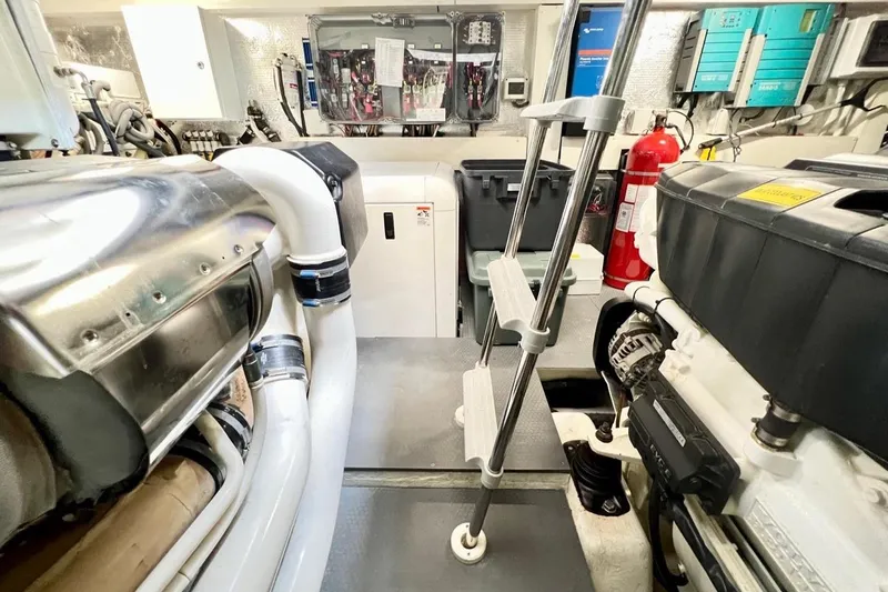 Slide: The Image of Engine room of 2015 Absolute 56 FLY yacht, featuring machinery and equipment. - 21