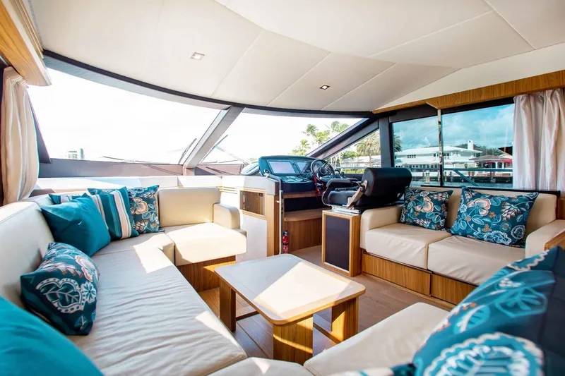 Slide: The Image of Luxurious interior of 2015 Absolute 56 FLY yacht with elegant seating and nautical decor. - 5