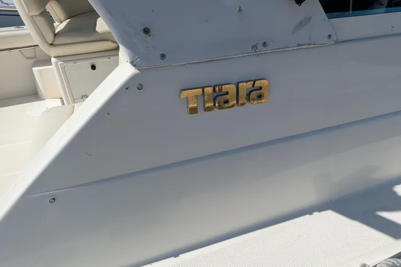 Slide: The Image of 1995 Tiara Yachts 3100 Open boat with gold logo detail. - 46
