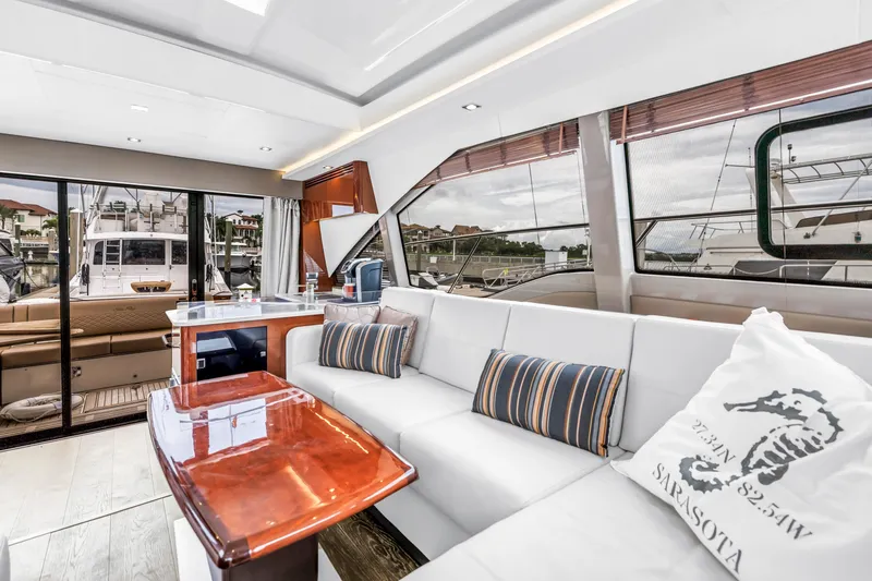 Slide: The Image of Luxurious interior of 2017 Sea Ray Sundancer 460 yacht with plush seating and elegant decor. - 29