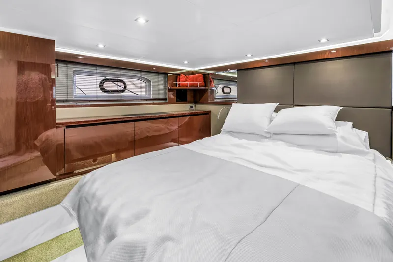 Slide: The Image of Luxurious cabin interior of 2017 Sea Ray Sundancer 460 yacht with elegant bedding. - 37