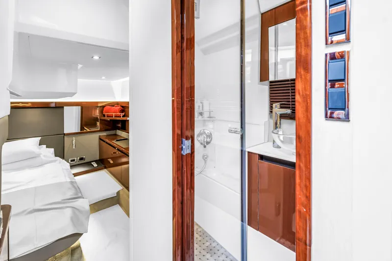 Slide: The Image of Luxurious interior of 2017 Sea Ray Sundancer 460 yacht with modern bathroom and cozy bedroom. - 45