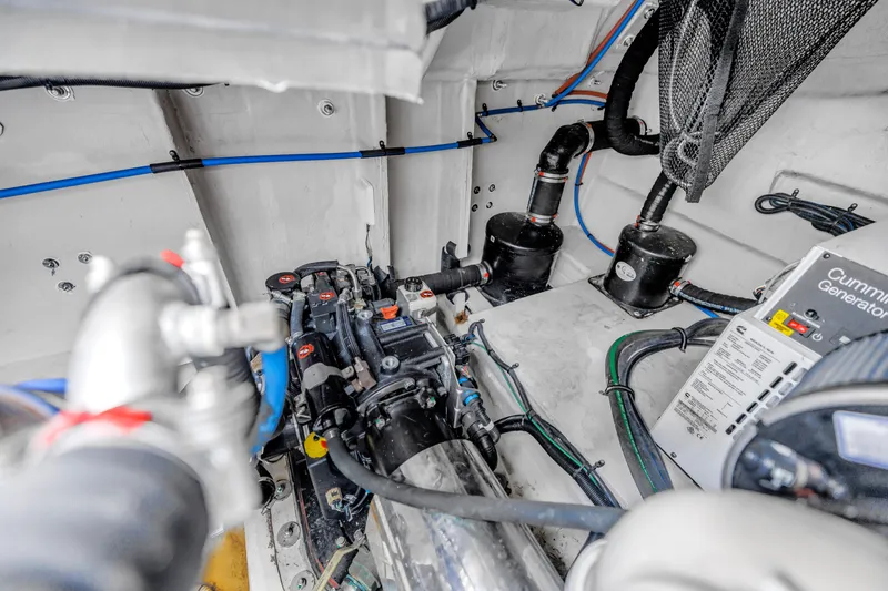 Slide: The Image of Engine room of 2017 Sea Ray Sundancer 460 with Cummins generator and mechanical components. - 50