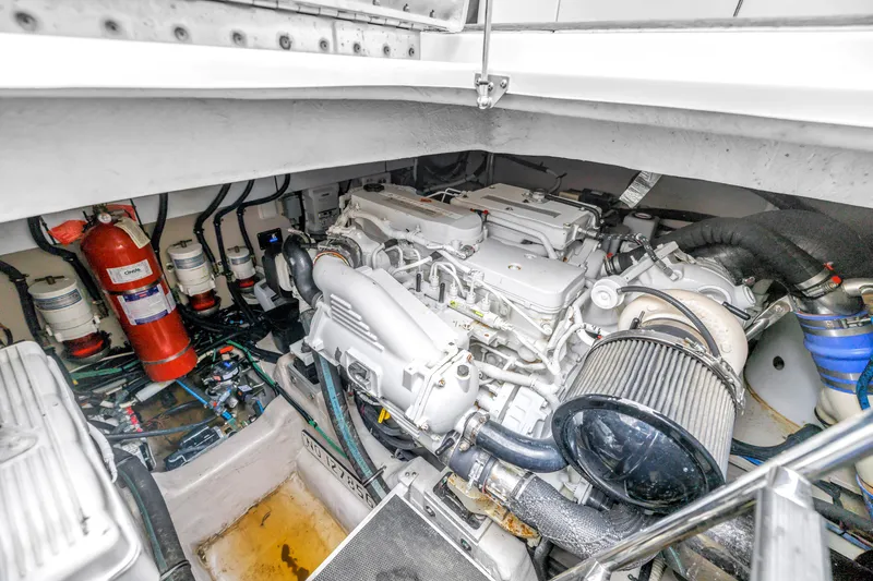 Slide: The Image of Engine room of 2017 Sea Ray Sundancer 460 yacht, showcasing mechanical components. - 53