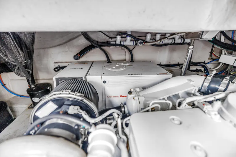 Slide: The Image of Engine room of 2017 Sea Ray Sundancer 460 with Cummins Onan generator. - 55