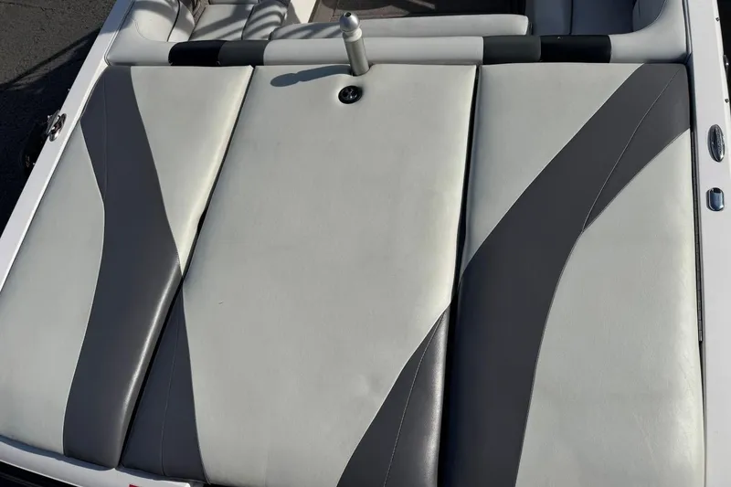 Slide: The Image of 2008 Moomba Mobius LSV boat interior with gray and white upholstery design. - 10
