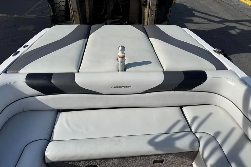 Slide: The Image of 2008 Moomba Mobius LSV boat interior with cushioned seating and sleek design. - 12