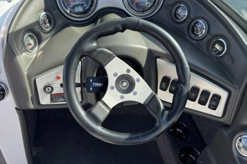 Slide: The Image of 2008 Moomba Mobius LSV dashboard with steering wheel and instrument panel. - 17