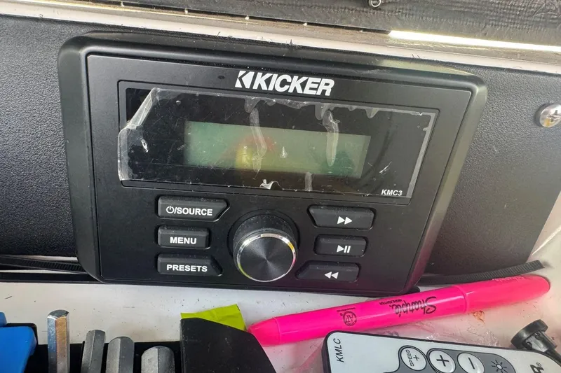 Slide: The Image of Kicker KMC3 stereo system in a 2008 Moomba Mobius LSV boat dashboard. - 22