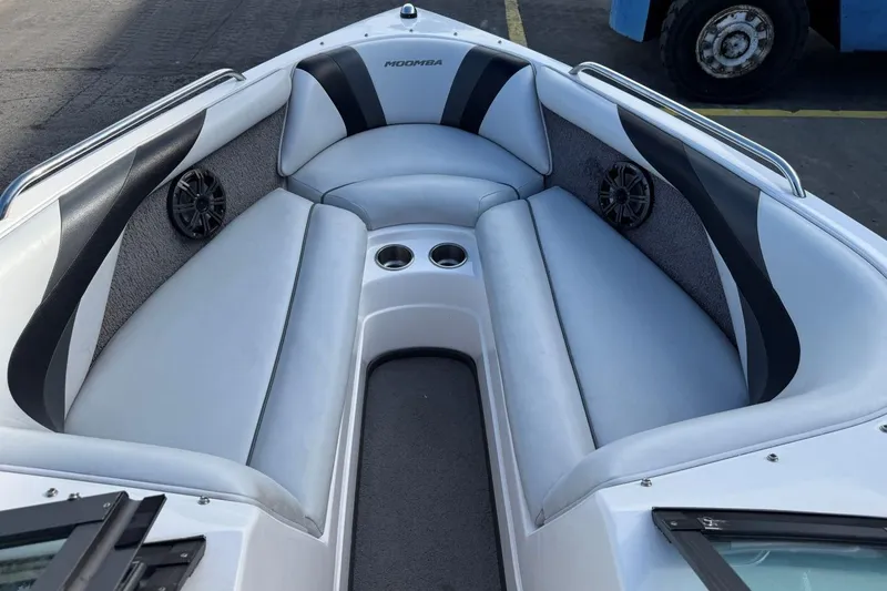 Slide: The Image of 2008 Moomba Mobius LSV boat interior with gray seating and cup holders. - 23