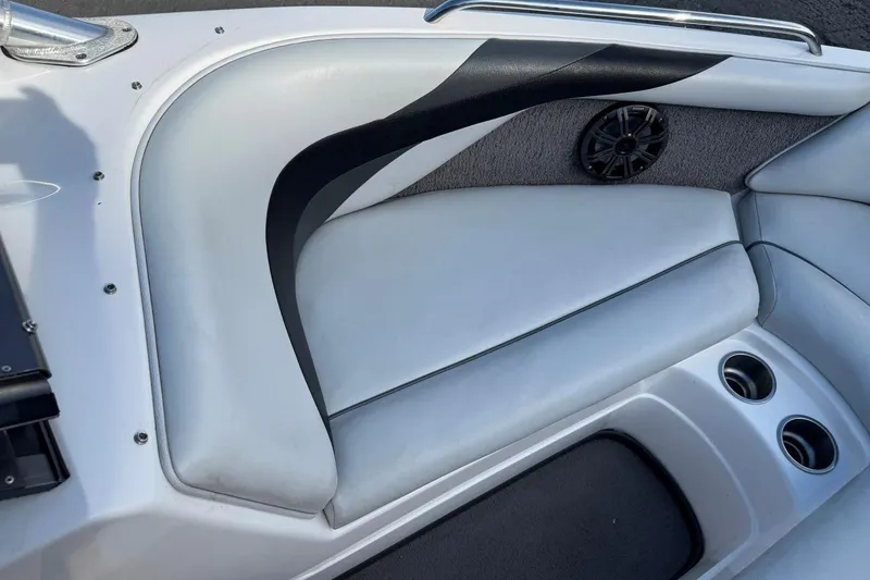 Slide: The Image of 2008 Moomba Mobius LSV boat interior with cushioned seating and speaker. - 28