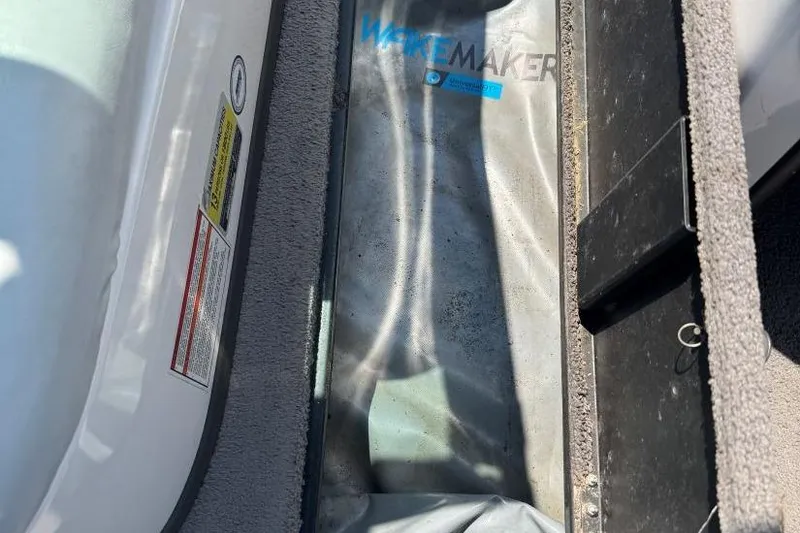 Slide: The Image of 2008 Moomba Mobius LSV interior storage compartment with Wakemaker ballast system. - 33