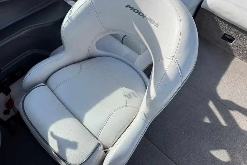 Slide: The Image of 2008 Moomba Mobius LSV boat seat with white upholstery and logo. - 34