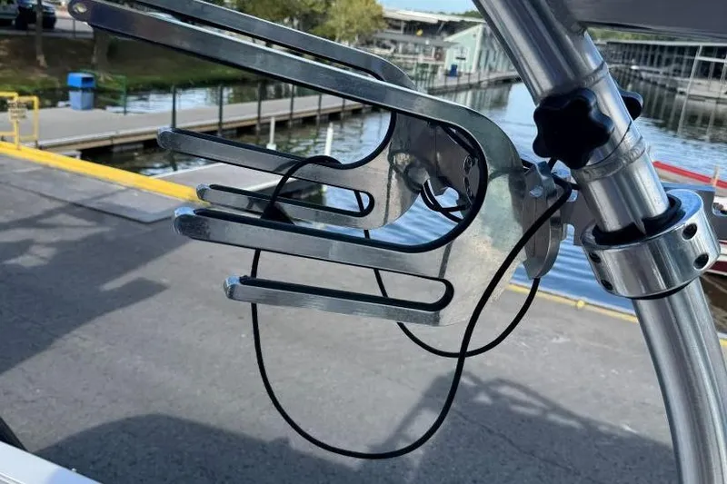 Slide: The Image of Wakeboard rack on 2008 Moomba Mobius LSV boat, dockside view. - 39