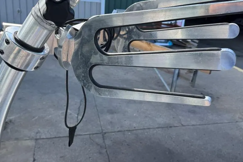 Slide: The Image of 2008 Moomba Mobius LSV wakeboard rack, metal construction, outdoor setting. - 40