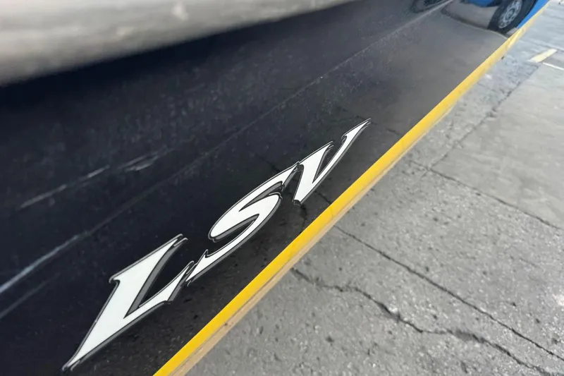 Slide: The Image of 2008 Moomba Mobius LSV boat with "LSV" emblem on the side. - 45