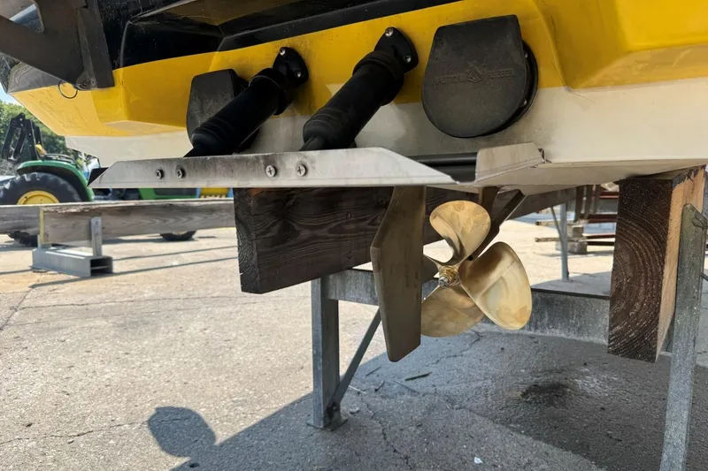 Slide: The Image of 2008 Moomba Mobius LSV boat propeller and rudder on a trailer. - 8