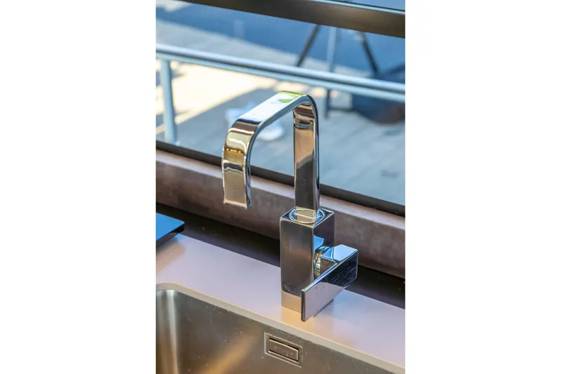 Slide: The Image of Modern chrome faucet on Cranchi Eco Trawler 53 Long Distance, 2018 model. - 101