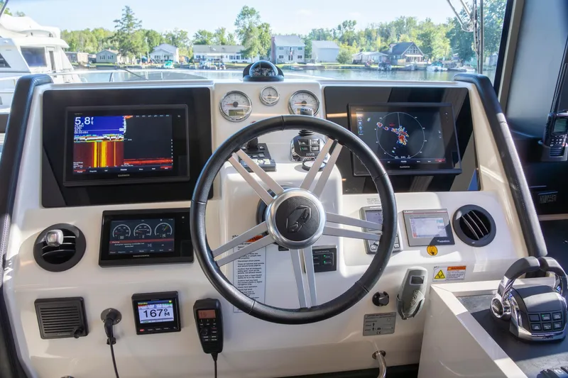 Slide: The Image of Cockpit of 2018 Cranchi Eco Trawler 53 Long Distance with advanced navigation displays. - 106