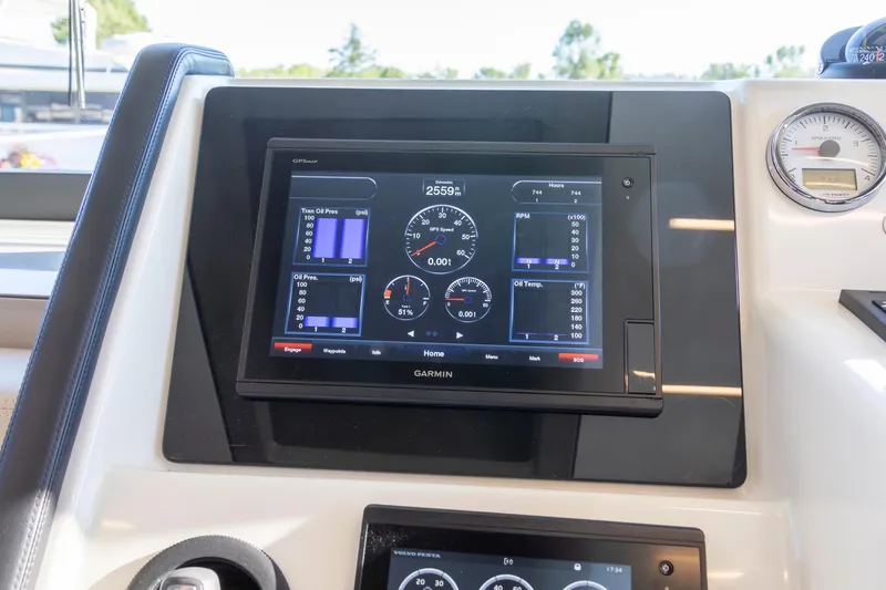 Slide: The Image of Garmin display on 2018 Cranchi Eco Trawler 53 Long Distance dashboard, showing engine metrics. - 112